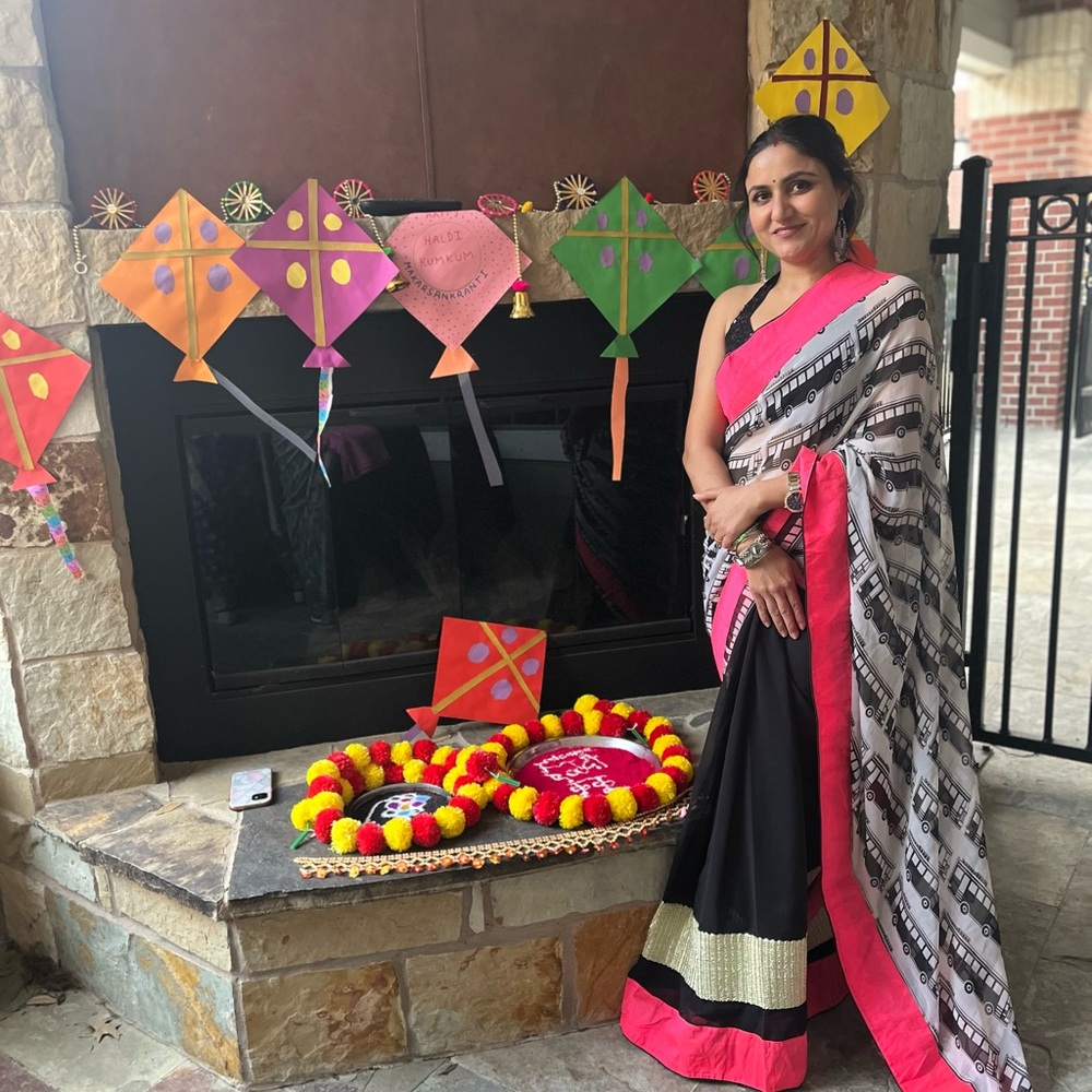 Vibrant Black and Pink Saree with Intricate Patterns